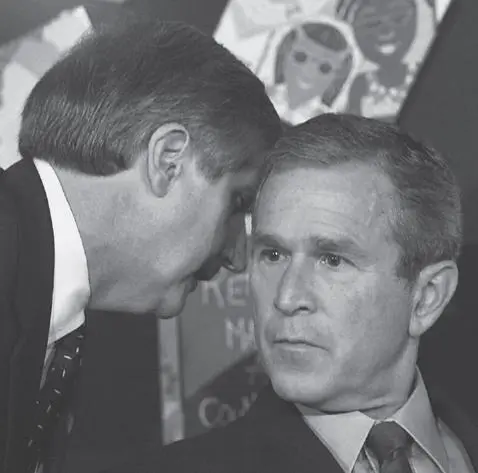 President Bush is told that a second plane has crashed Paul J - фото 28