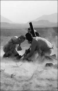 Dutch soldiers in Uruzgan Province launch mortar rounds near Mirabad While - фото 19