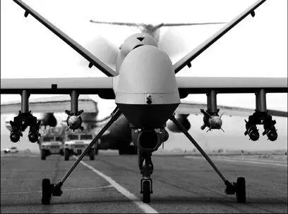 An armed MQ9 Reaper unmanned aerial vehicle UAV taxis down a runway in - фото 21