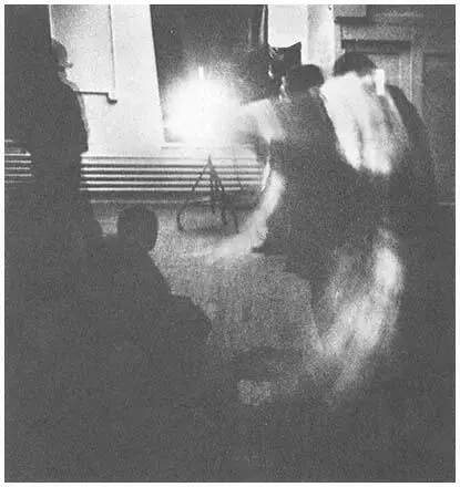 The audience investigates the projector beam during McCalls Line Describing a - фото 4