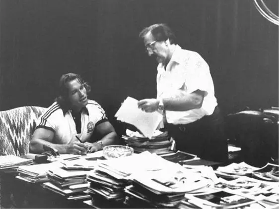 Joe Weider and I pore over photographs working on magazine layouts Albert - фото 23
