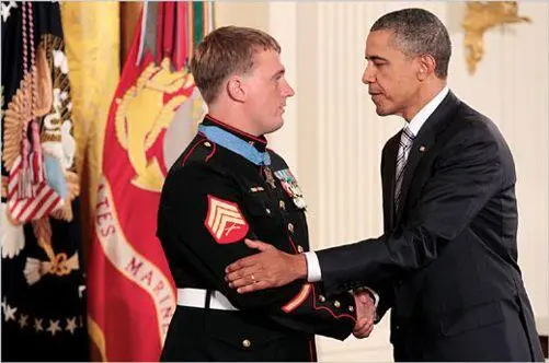 Dakota and President Obama at the Medal of Honor ceremony AP PhotoPablo - фото 25