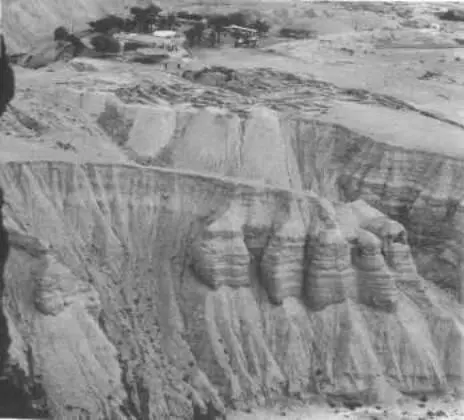 29 The ruins of Qumran Caves 4 and 5 can be seen at the end of the nearer - фото 30