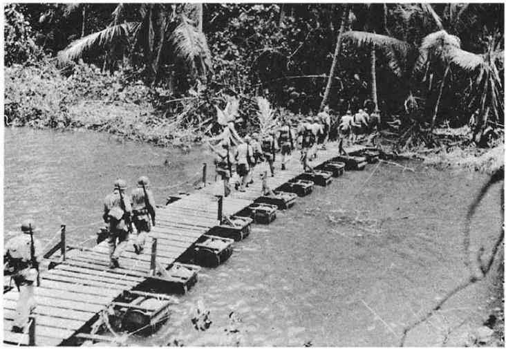 Marines such as these riflemen crossing the Matanikau River patrolled the - фото 24