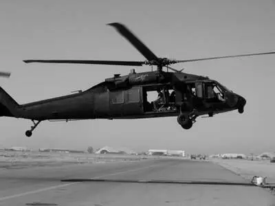 An MH60 Blackhawk from Task Force 185 Aviation takes off on a mission from - фото 18