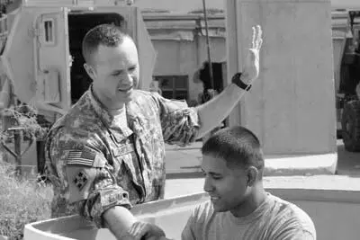 Chaplain Capt Matt Hamrick April 21 conducting a baptism service in Iraq - фото 2