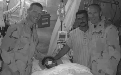 Chaplain Erikson with Saleh his father Raheem and Dr Jay Johannigman Last - фото 7