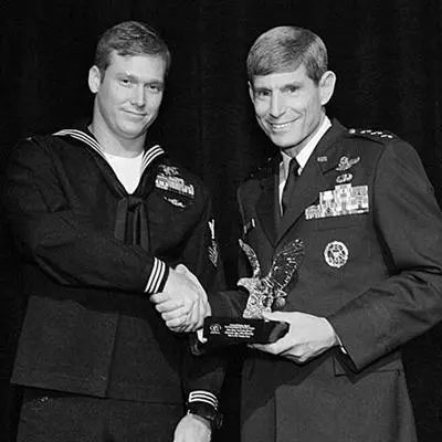 General Peter Pace the head of the Joint Chiefs of Staff hands me the - фото 12