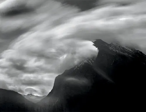 At sunrise clouds were flying rapidly over the western slope of Mt Rundle - фото 38
