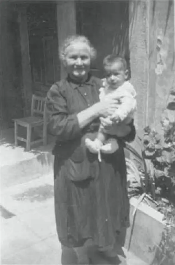 My grandmother has a child in her arms but I dont know who it is He looks to - фото 13