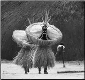 Two Kuikuro Indians dance in celebration of the whirlwind spirit Courtesy of - фото 47
