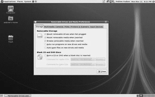 FIGURE 31 Fedoras GNOME desktop uses the metacitywindow manager and offers a - фото 41