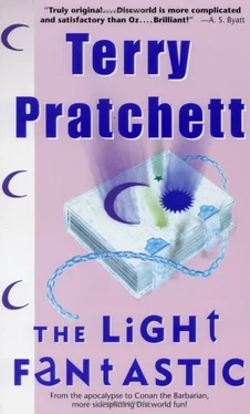 Terry Pratchett The Light Fantastic обложка книги