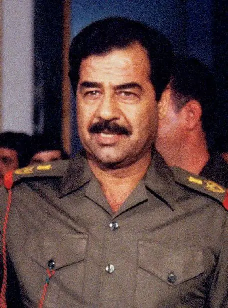 Pierre Perrin GammaRapho via Getty Images Saddam Hussein wearing his - фото 48