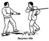 С шагом в сторону и вперед встретить вооруженную руку на замахе рис 68б - фото 140