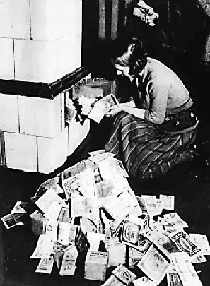 Германия 1923 г Женщина топит печку бумажными деньгами Представьте себе - фото 4