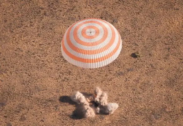 Our Soyuz spacecraft as it crashes back onto Earth on March 2 2016 Credit 53 - фото 78
