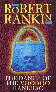 Роберт Рэнкин The Dance of the Voodoo Handbag обложка книги