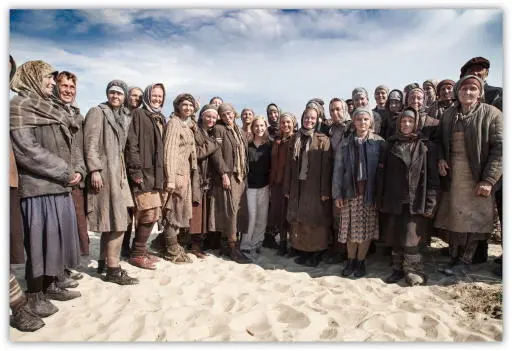 Photo 2016 J Michael Smith Ruta Sepetys center on set with the extras in - фото 33
