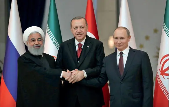 21 Putin the Peacemaker Putin meets Iranian President Hassan Rouhani and - фото 55