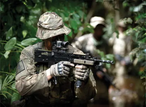 A Royal Marine of 45 Commando during a multinational exercise at the Jungle - фото 18