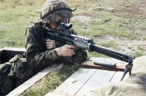 The revised LSW with the rearwardfolding bipod mounted closer to the muzzle - фото 20