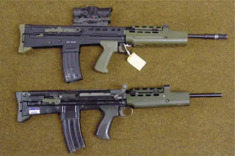 An L98A1 Cadet Rifle below compared to an L85A1 IW Note the manual - фото 23