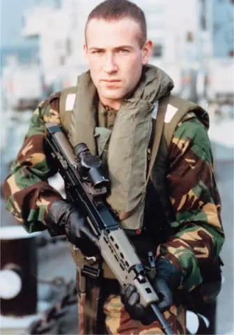 A Royal Marine armed with an L85A1 aboard HMS Brave during the 1991 Gulf War - фото 27