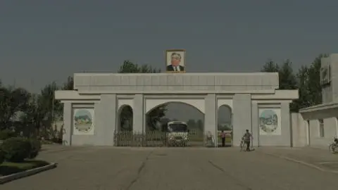 The entrance to the Pyongyang Film Studio watched over by Kim Il Sung North - фото 2
