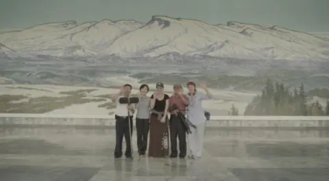 Me cinematographer Nicola Daley and our North Korean film crew inside the - фото 10