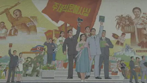 The massive Flower Girl mural at the Pyongyang Film Studiostanding beside it - фото 11