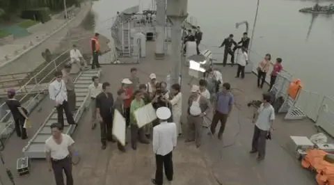 Mr Ri and his crew shoot a scene on the captured American spy ship the USS - фото 19