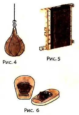 Боксерская груша представляет собой кожаный мешок сделанный сшитый в форме - фото 3