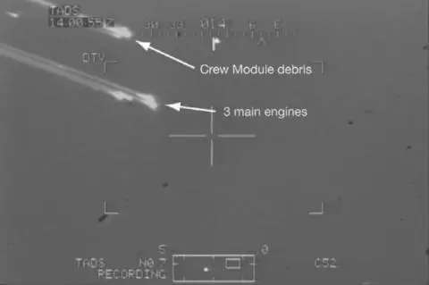 Annotated frame from a gunsight camera video of Columbia s breakup taken by - фото 44