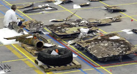 Portions of Columbia s righthand main landing gear and landing gear doors - фото 72