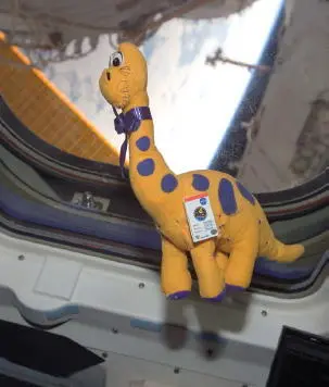 The yellow dinosaur that was the mascot of the crew module reconstruction team - фото 75