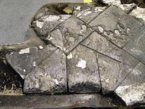 Slumped and pitted tiles from the underside of Columbia s left wing show that - фото 76