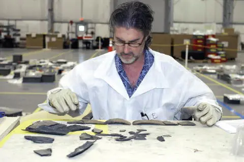 NASA structures engineer Lyle Davis attempts to reconstruct a part of one of - фото 79