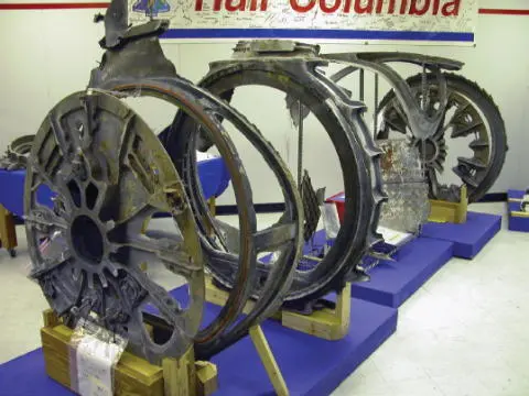 Recovered sections of Columbia s airlock and tunnel to Spacehab in the - фото 84