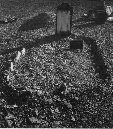 The grave of 20yearold John Torrington after the removal of the gravel mound - фото 14