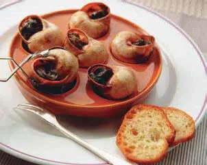 Блюдо классической французской кухни из улиток Часто встречается в меню - фото 94