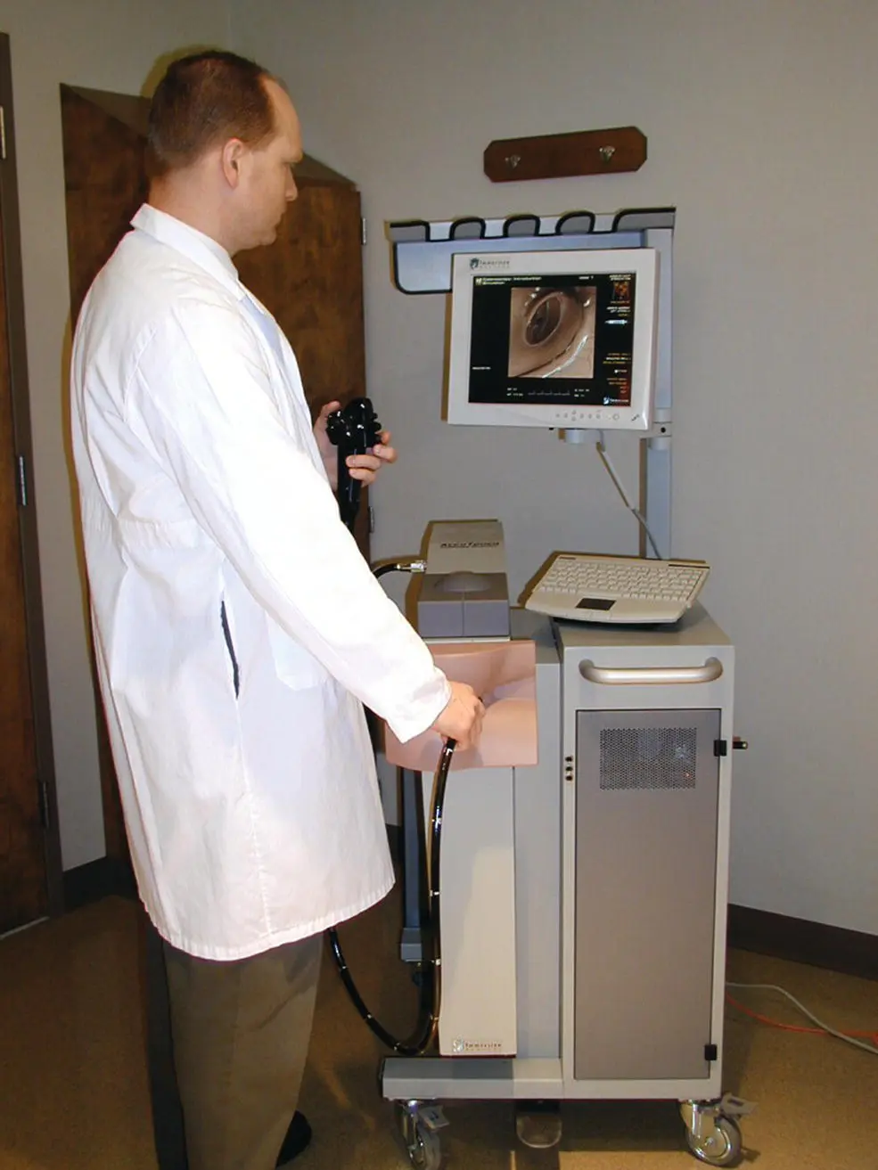 Figure 631 A trainee using a virtual reality colonoscopy simulator Figure - фото 89
