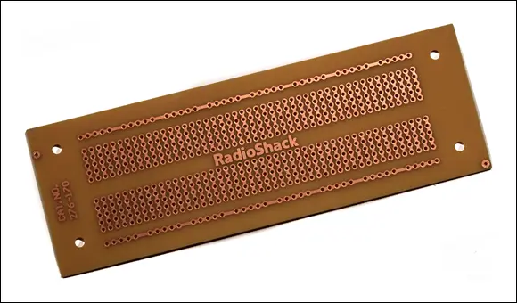 FIGURE 614A preprinted PCB that uses a standard breadboard layout Some - фото 117