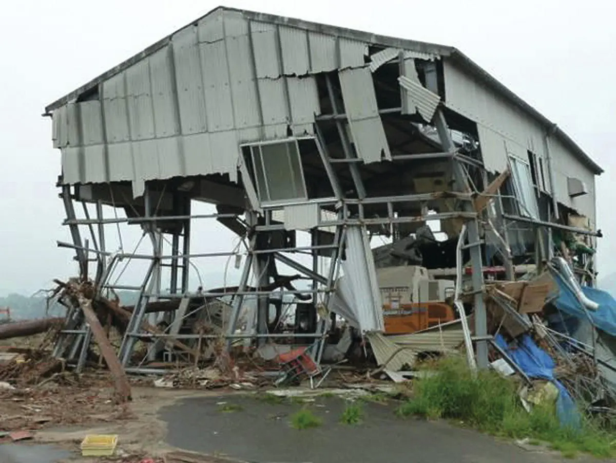 Figure 216Typical damage in tsunamiaffected region Steel frame building in - фото 17