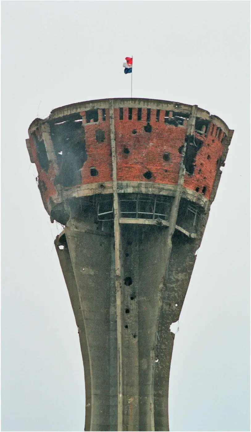 Ein Mahnmal für sinnlose Zerstörung der Wasserturm von Vukovar Die Schule als - фото 32