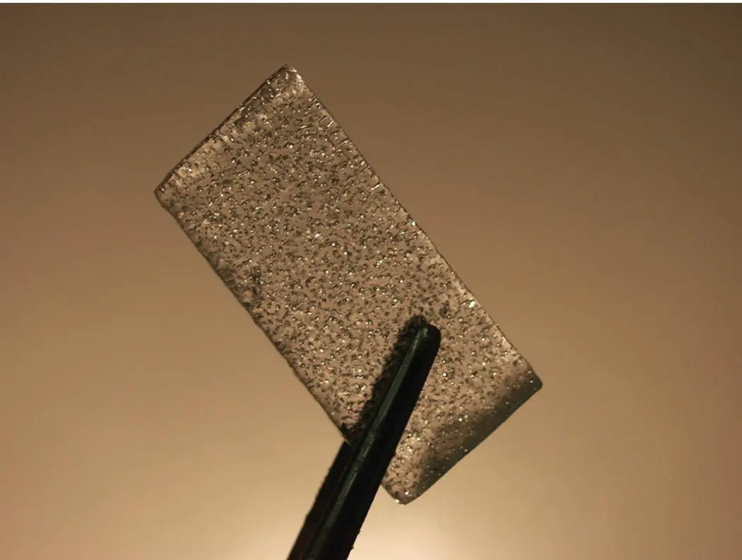 FIGURE 16 Piece of an Antarctic ice core showing trapped air bubbles - фото 6
