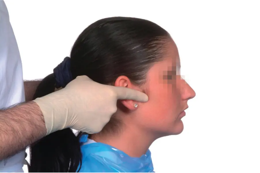 Figure 36Lateral palpation of the temporomandibular joint M Ziad AlAni - фото 45