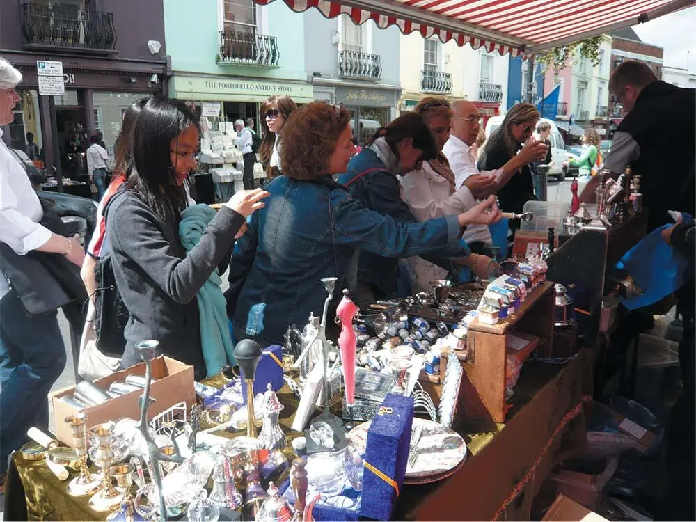 An antiques and vintage market demonstrates structure and agency in economic - фото 60