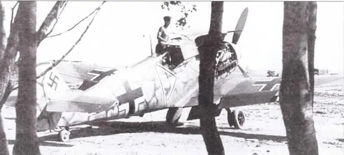 Bf 109F2 из состава 1IJG 54 на одном из советских аэродромов Эмблема группы - фото 34