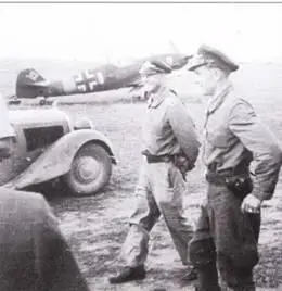 Два пилота IIIJG 77 на аэродроме Яссы в июле 1941 года На заднем плане - фото 35